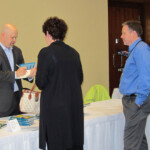 Book signing after my keynote in Detroit Michigan. album-MEETING_0023_Layer 8